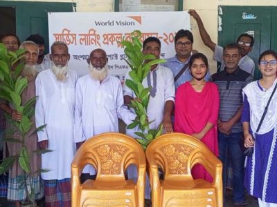 ফুলবাড়ীয়ায় ইম্প্যাক্ট প্লাস গ্রুপের গাছের চারা ও চেয়ার বিতরণ